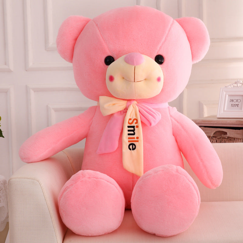Smiling scarf teddy bear doll