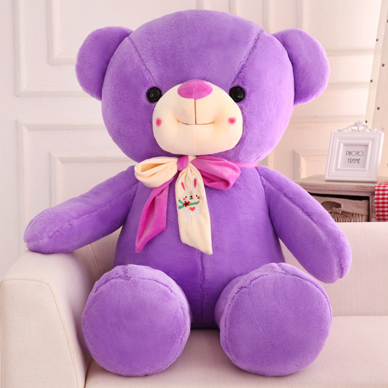 Smiling scarf teddy bear doll